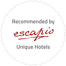 Empfehlungs-Badge 'Recommended by escapio Unique Hotels' für BLUME. Baden Hotel & Restaurant.