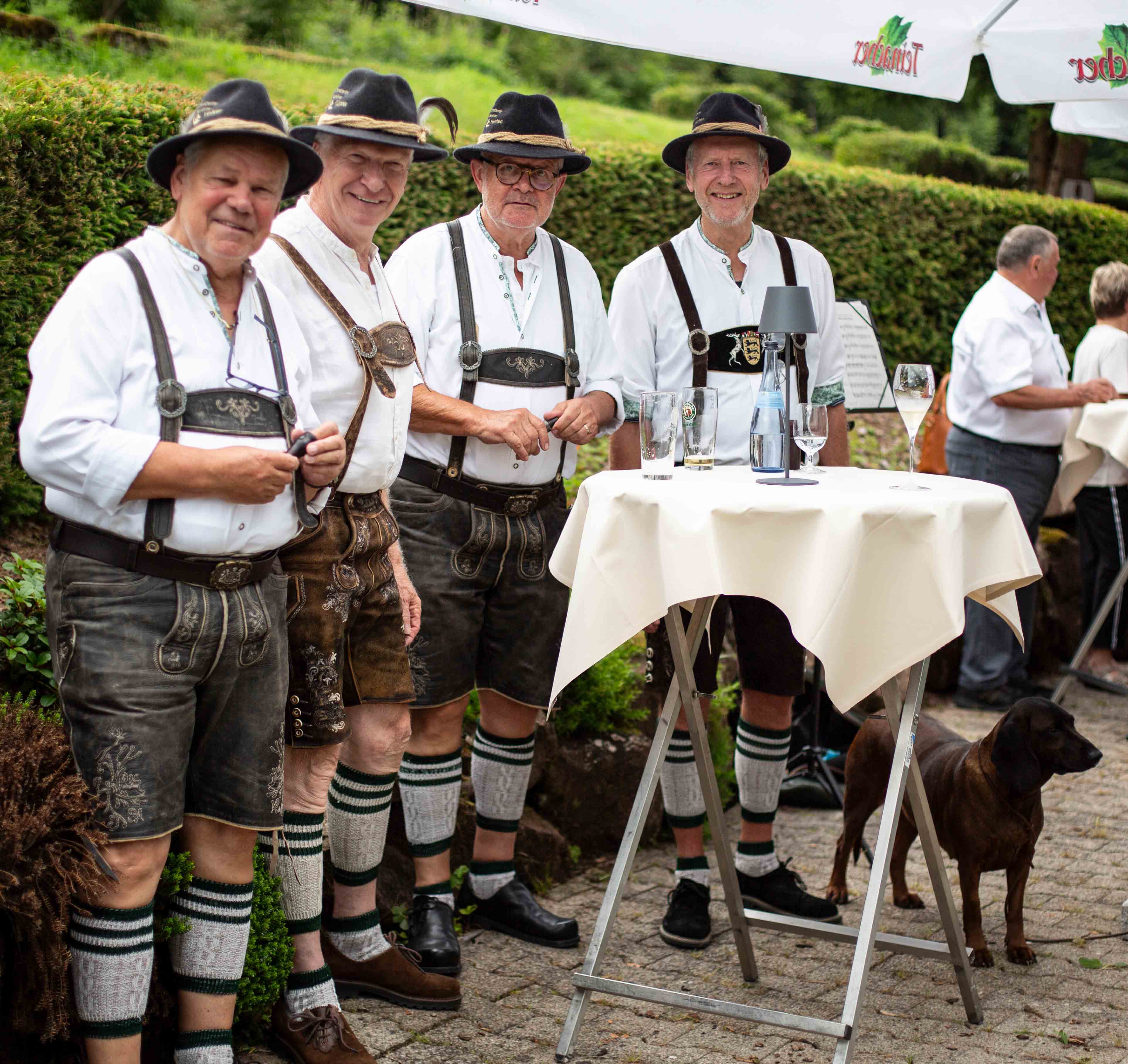 Hotel Waldsägmühle in Pfalzgrafenweiler-Kälberbronn – Männer in Tracht bei einer Veranstaltung | Wellnesshotel Schwarzwald