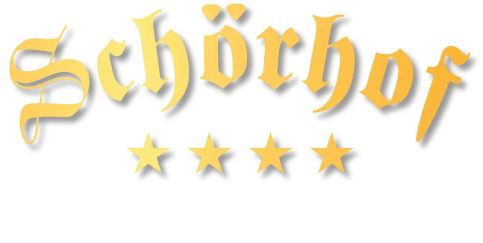 Logo des Hotel Schörhof mit vier Sternen und dem Schriftzug 'Wellness • Hotel • Gasthof'.