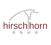 Logo des Hotel Am Hirschhorn mit stilisiertem Hirschgeweih und 4 Sternen.