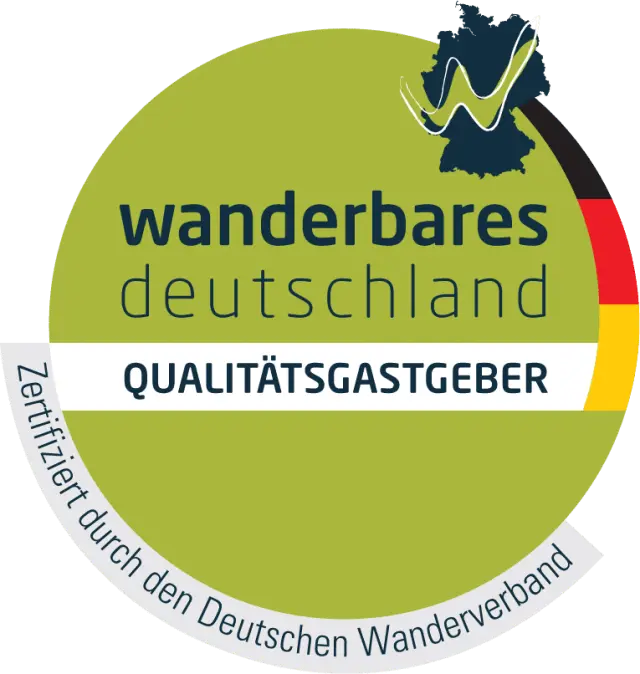 Zertifizierungslogo 'wanderbares deutschland QUALITÄTSGASTGEBER' für das Hotel Kesslermühle.