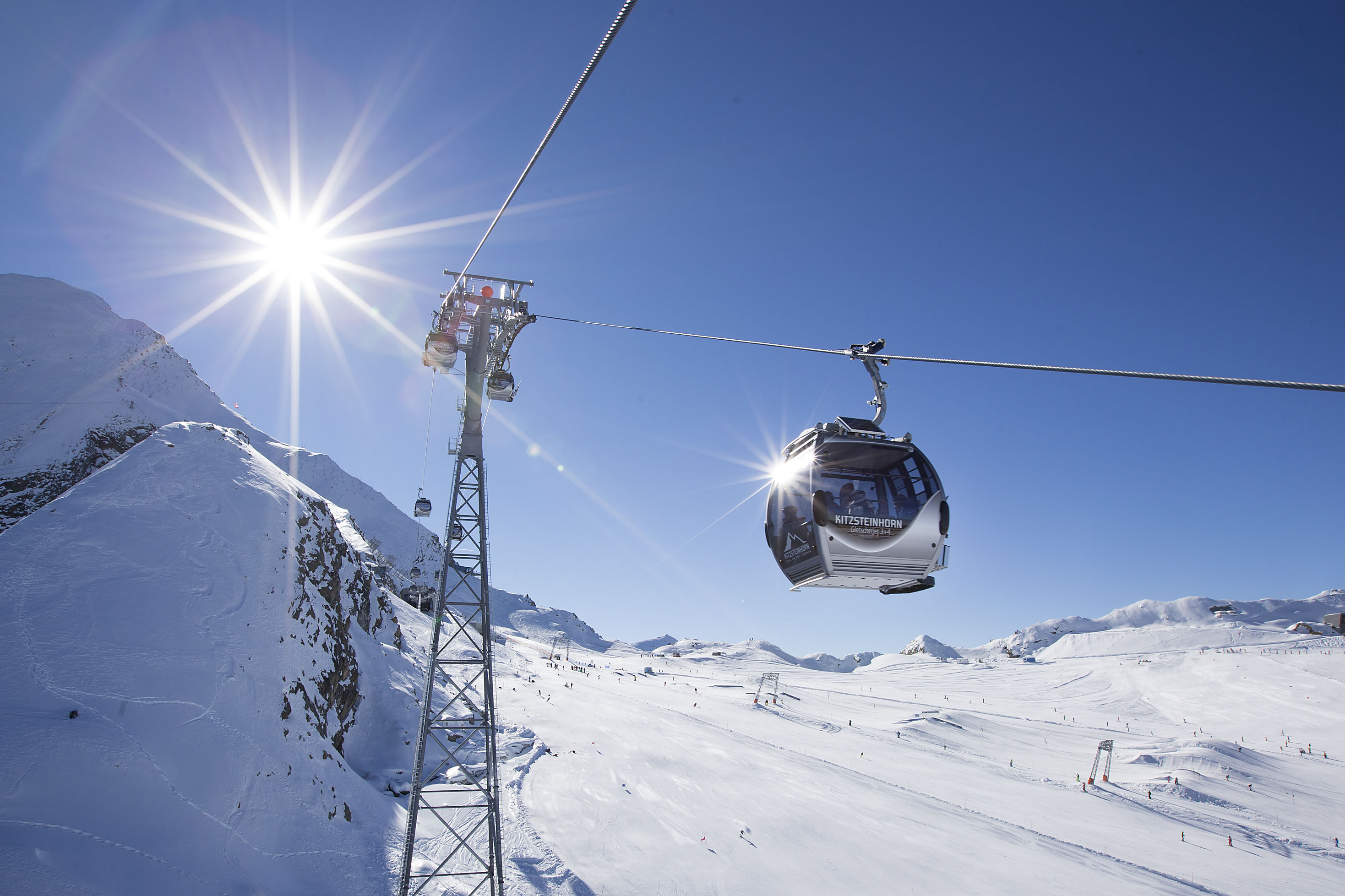 Das Alpenhaus Kaprun in Kaprun – Gondelbahn vor dem Kitzsteinhorn Bergpanorama | Wellnesshotel Pinzgau