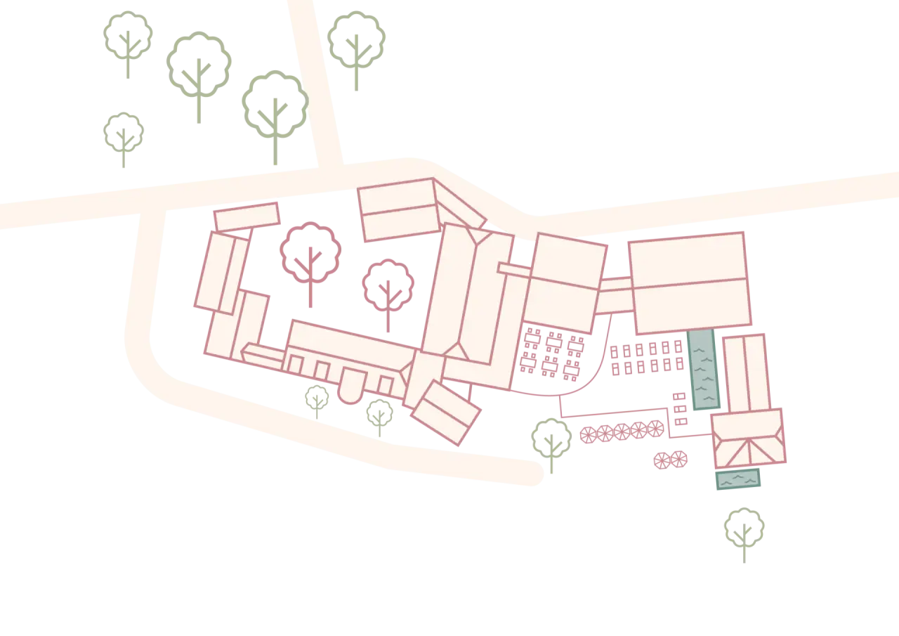 Schematischer Lageplan des Hotel Jordan's Untermühle mit Gebäuden, Wegen und Grünflächen.