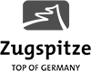 Logo der Zugspitze mit Bergmotiv und Schriftzug 'TOP OF GERMANY'.